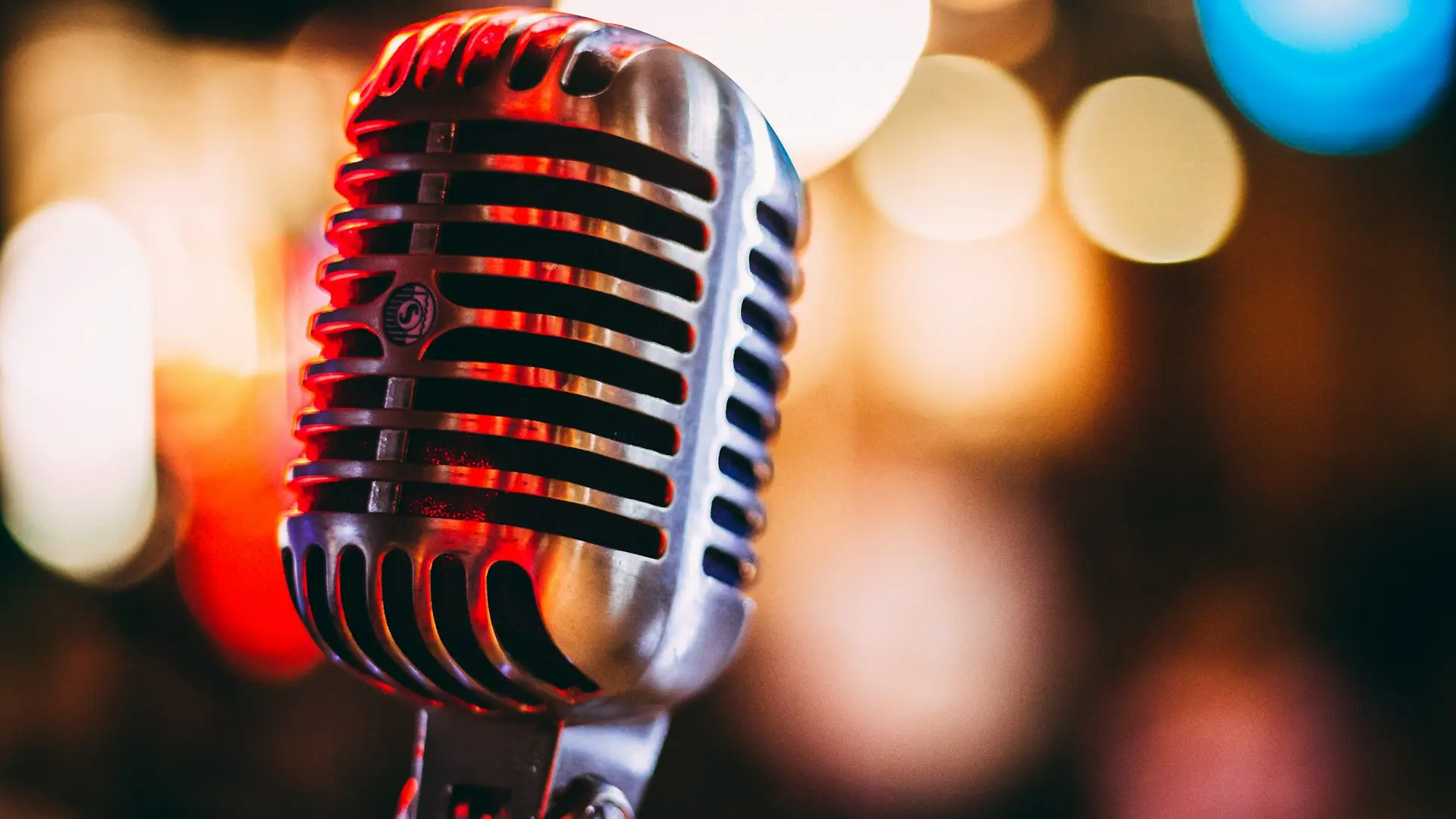 bokeh photography of condenser microphone